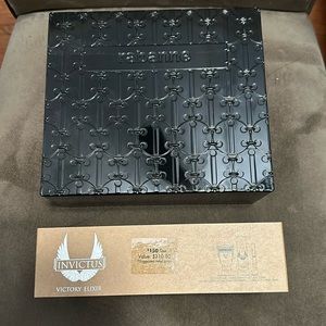 Empty invictus victory elixir cologne metal can
